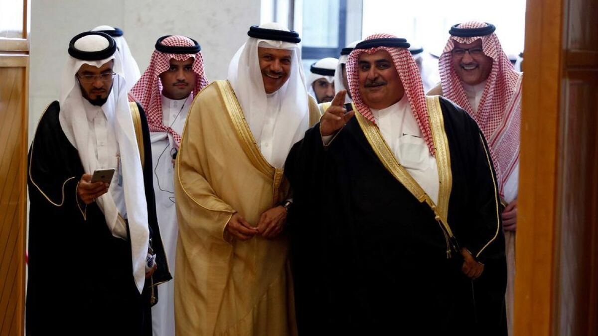 Secretary-General of the Gulf Cooperation Council Abdullatif bin Rashid Al Zayani and Bahrains Foreign Minister Khalid bin Ahmed Al Khalifa walk during a meeting of Foreign Ministers of GCC member states, in Riyadh. 