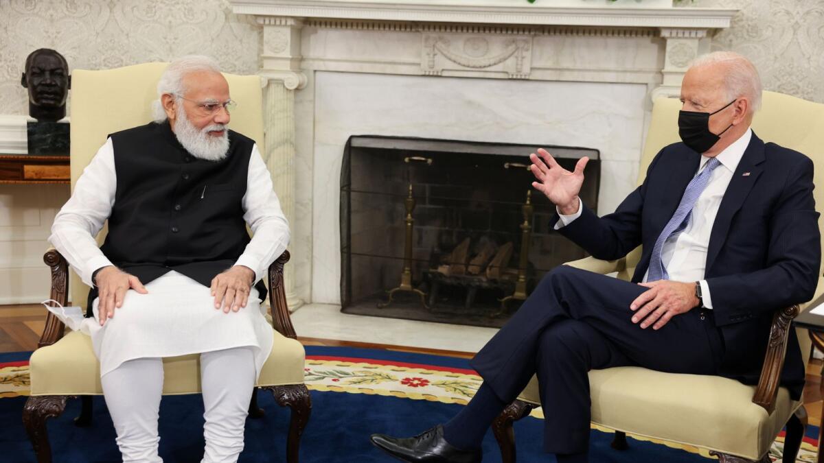 Joe Biden speaks with Narendra Modi at the Oval Office of the White House. — Reuters