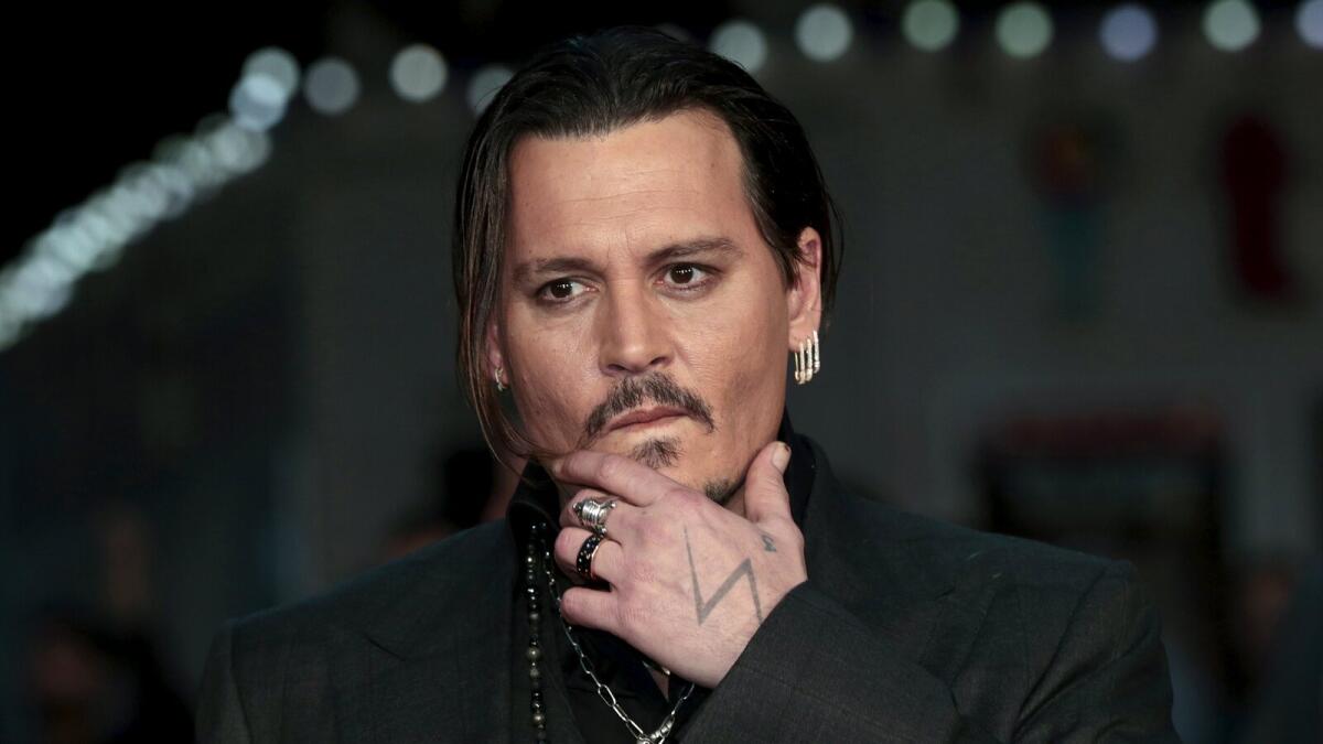 Im not in competition with anybody: Johnny Depp