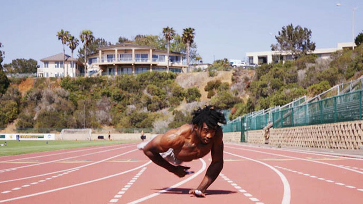 Zion Clark takes the record for fastest 20 metres walking on hands. — Courtesy: guinnessworldrecords.com