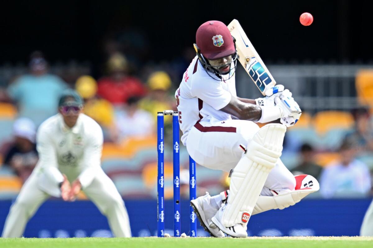 West Indies' Kirk McKenzie bats against Australia on the third day of their cricket Test match in Brisbane on Saturday. - AFP