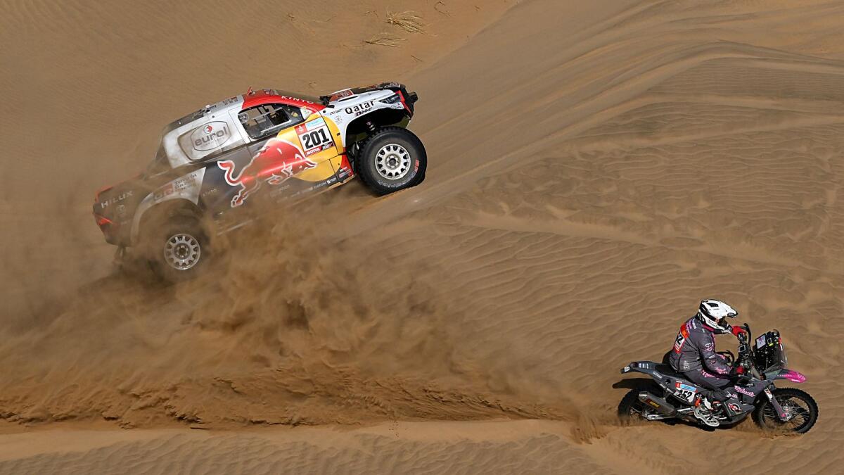 Toyota driver Nasser Al Attiyah of Qatar competes during the Stage 11 of the Dakar Rally on Thursday. (AFP)