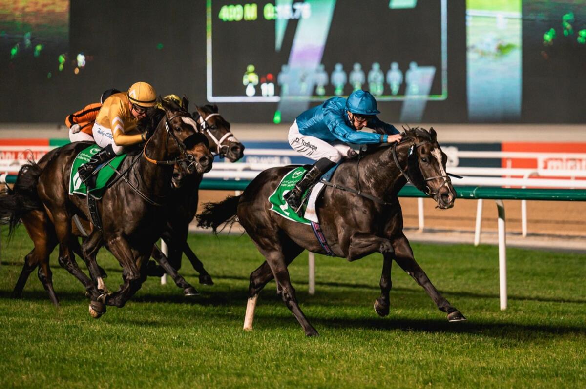 Open Mind, ridden by Daniel Tudhope, wins the DWCC Expedition at Meydan. — Photo by Neeraj Murali
