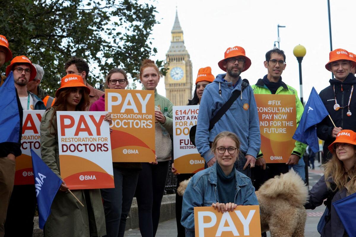 Health workers protest on a picket line as junior and senior doctors in England take part in a joint strike action for the first time, outside St Thomas's Hospital in London, Britain, on  September 20, 2023. — Reuters file