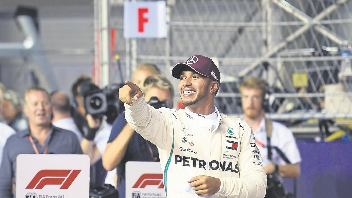 Hamilton claims stunning pole position in Singapore