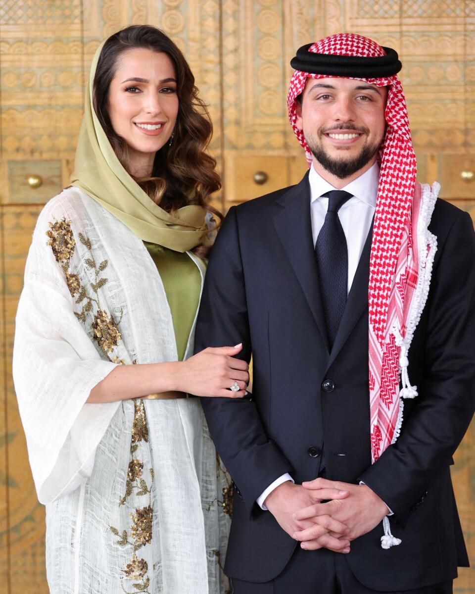 Jordan's Crown Prince Hussein stands with Rajwa Al Saif, the youngest daughter of Saudi businessman Khaled Al Saif, during their engagement in Riyadh, Saudi Arabia. Photo: Reuters