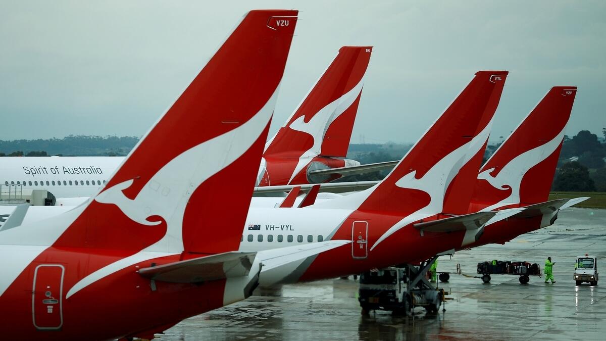 Qantas, repays, over $4 million, staff, underpaid, 8 years