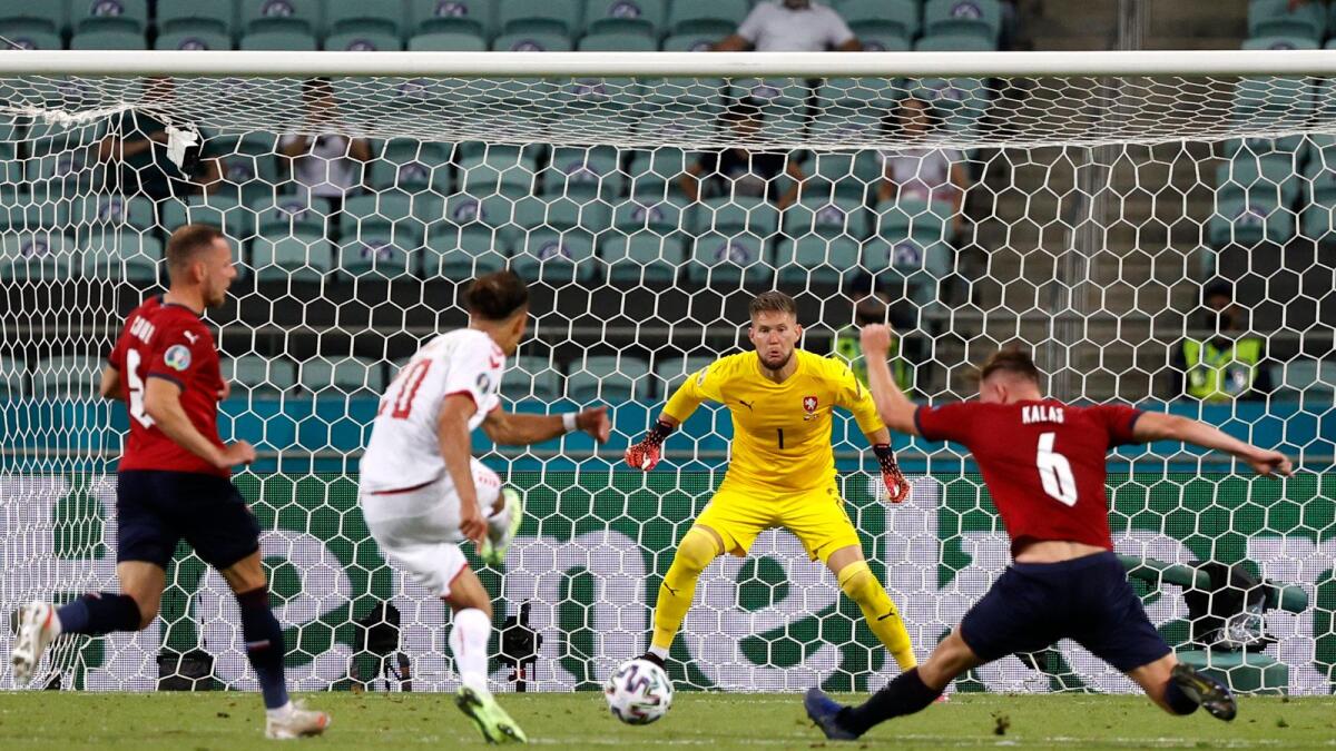 Denmark's Yussuf Poulsen shoots at goal during the Euro 2020 match against Czech Republic. — Reuters