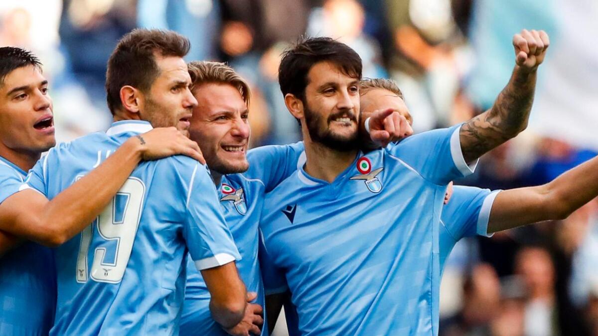 Lazio players celebrate a goal against Crotone.—  AP