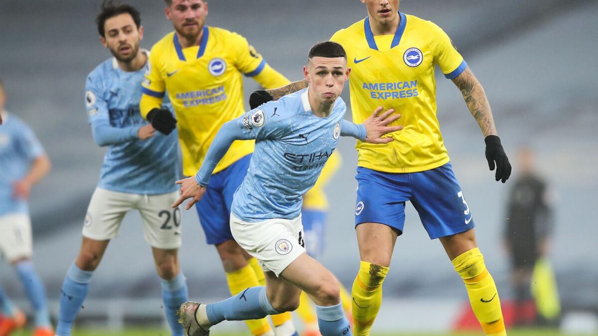 Manchester City's English midfielder Phil Foden on the ball during the English Premier League football match against Brighton and Hove Albion. — AFP