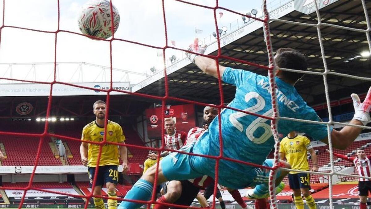 Sheffield United's David McGoldrick scores their first goal (Reuters)
