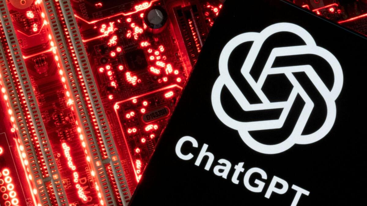 A smartphone with a displayed ChatGPT logo is placed on a computer motherboard in this illustration taken February 23, 2023. — Reuters