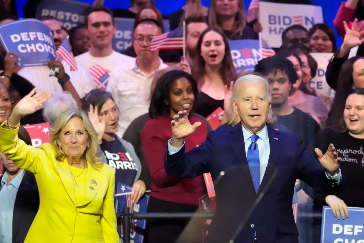President Joe Biden is joined on stage by first lady Jill Biden at an event on the campus of George Mason University in Manassas, Virginia, on  January 23, 2024, to campaign for abortion rights, a top issue for Democrats in the upcoming presidential election. — AP