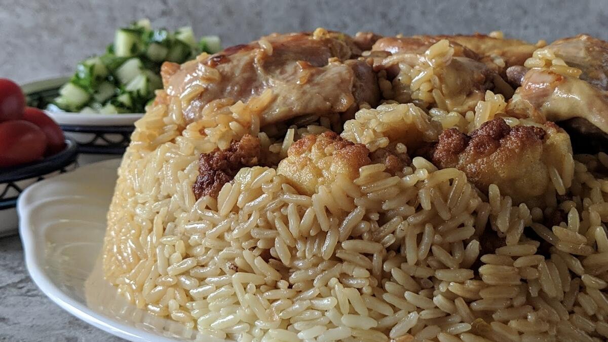 Maqluba, chicken and rice, bone stuck in throat