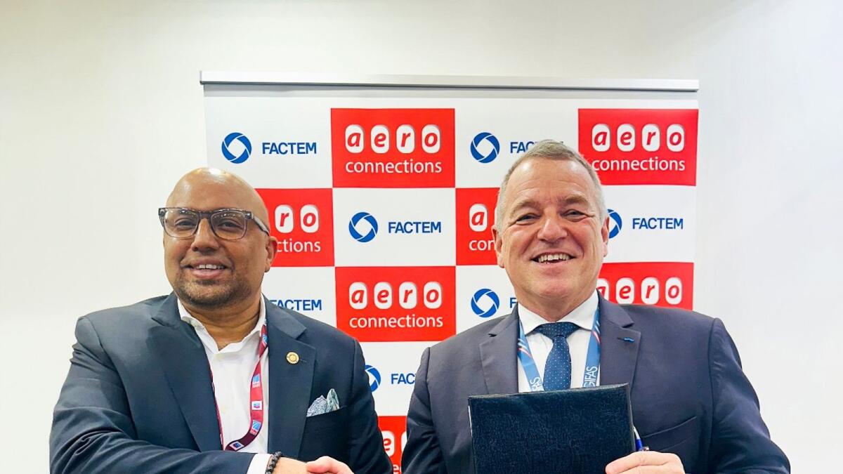Alain Dulac, chief executive officer of Factem, and Manoj John, founder &amp; CEO of AeroConnections, at the signing of the  distributor agreement.