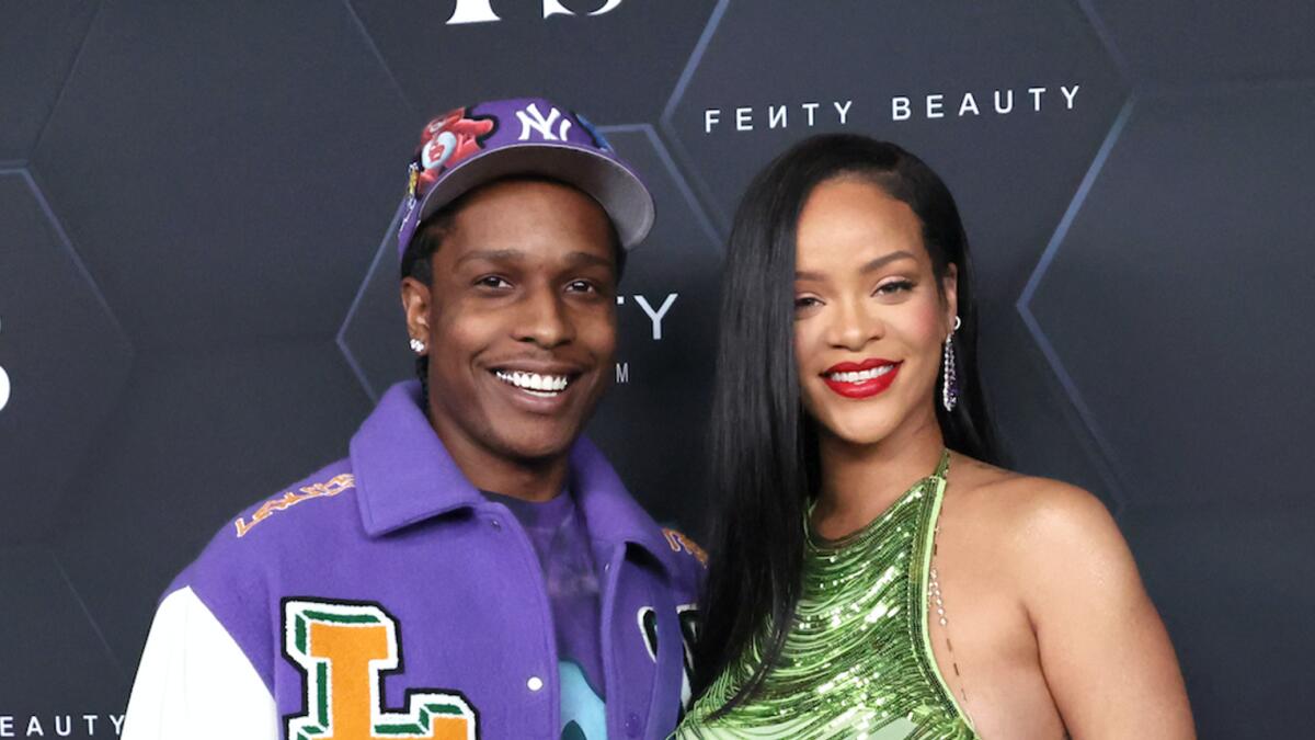 ASAP Rocky and Rihanna pose for a picture as they celebrate her beauty brands Fenty Beauty and Fenty Skinat Goya Studios on February 11, 2022 in Los Angeles. Photo: AFP