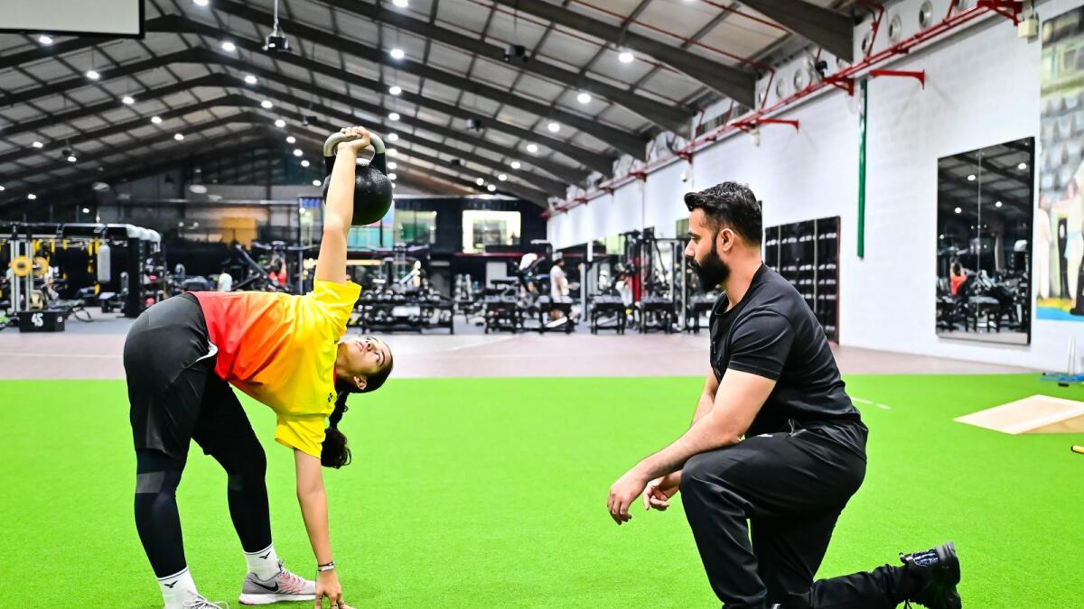 Shahbaz Haider, Personal Trainer, trains Taabia Khan, UAE top 3 ranked in Girls badminton at the AB Fitness in Dubai. Photo by Neeraj Murali.