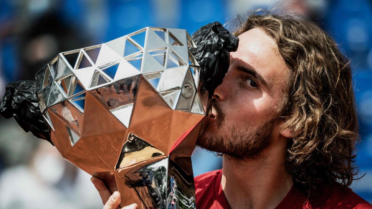 Greece's Stefanos Tsitsipas poses with the trophy after winning the ATP 250 Lyon Open Parc tennis tournament final. — AFP