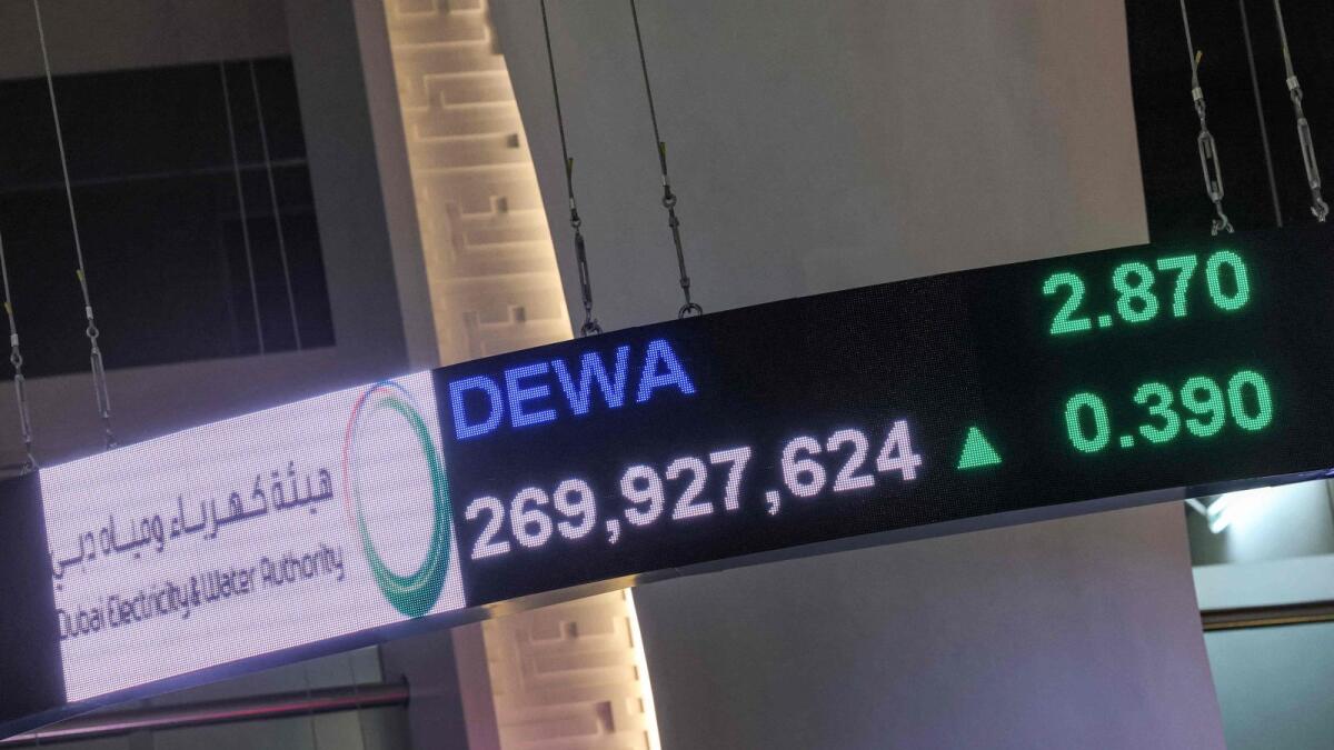 A view of an electronic display showing the current value of the stocks of the Dubai Electricity and Water Authority (DEWA), at the Dubai Financial Market stock exchange. — AFP file photo