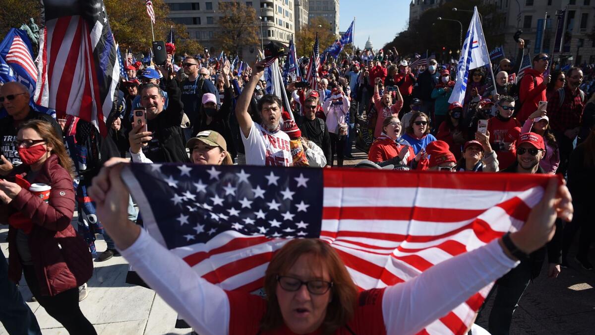 Supporters of US President Donald Trump rally in Washington, DC, on November 14, 2020.  AFP