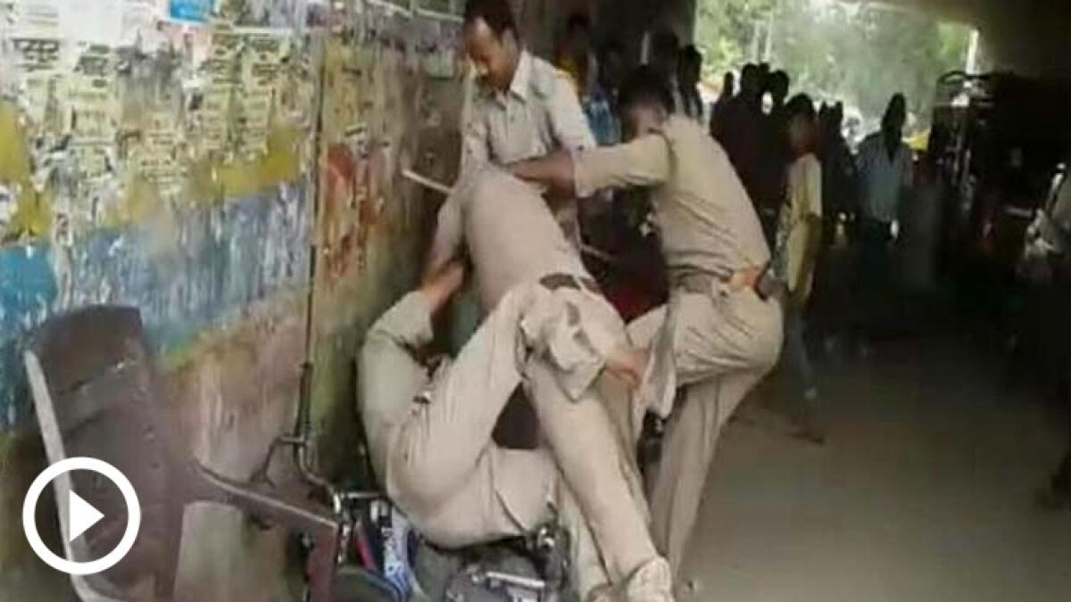 Caught on camera: Police fight each other over bribe