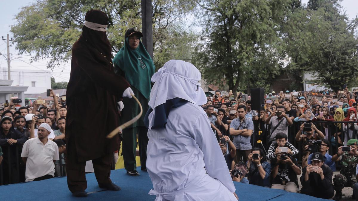 In Indonesia, couples caned in front of crowd for public shows of affection 