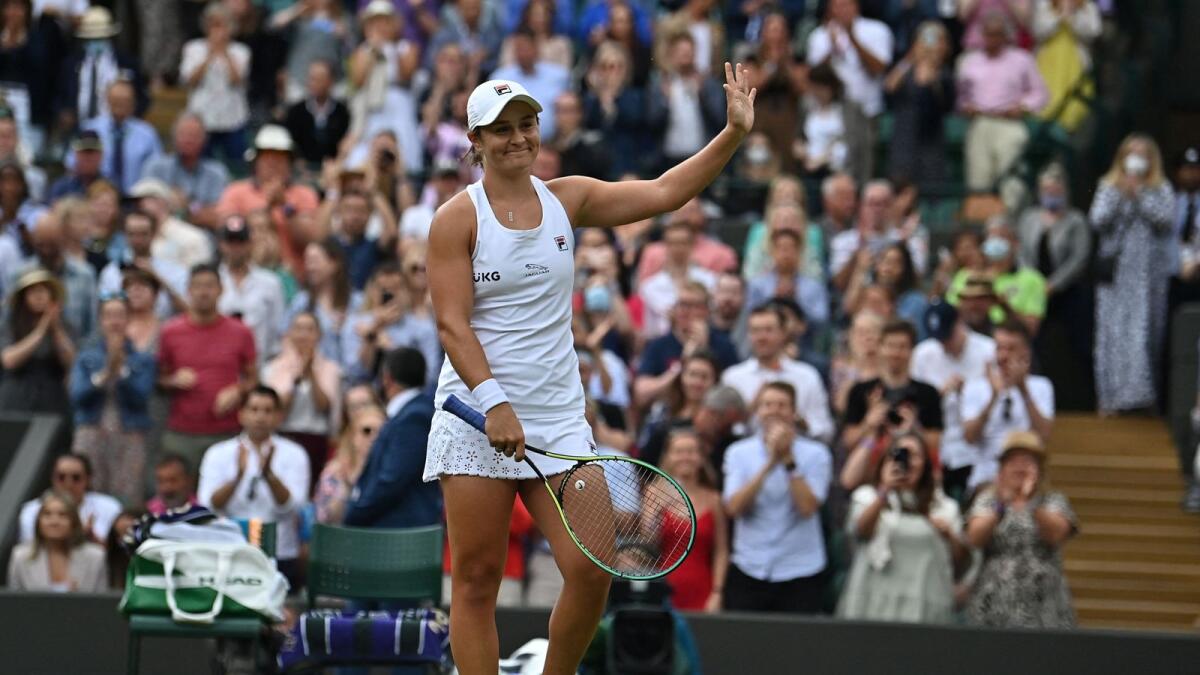 Australia's Ashleigh Barty celebrates after beating Czech Republic's Barbora Krejcikova. — AFP