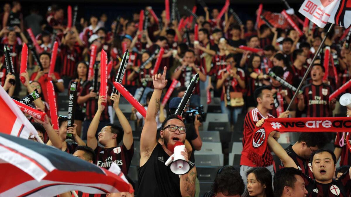 Fan mania greets European giants in China