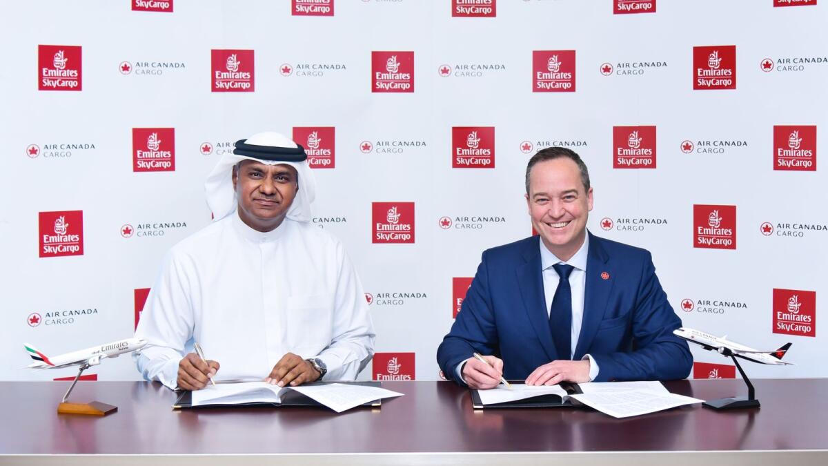 Nabil Sultan, Emirates Divisional Senior Vice President, Cargo and Matthieu Casey, Managing Director Commercial, Air Canada Cargo sign the agreement.  - Supplied photo