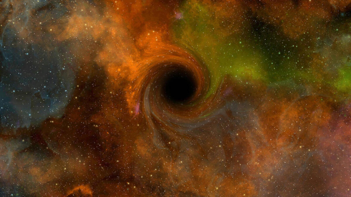 Scientists reveal first ever image of black hole