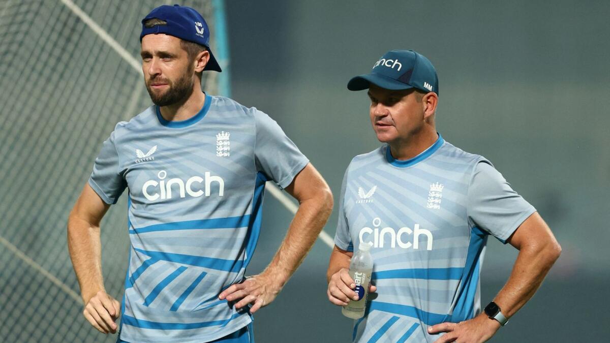 England's Chris Woakes and coach Matthew Mott during a practice session. - Reuters