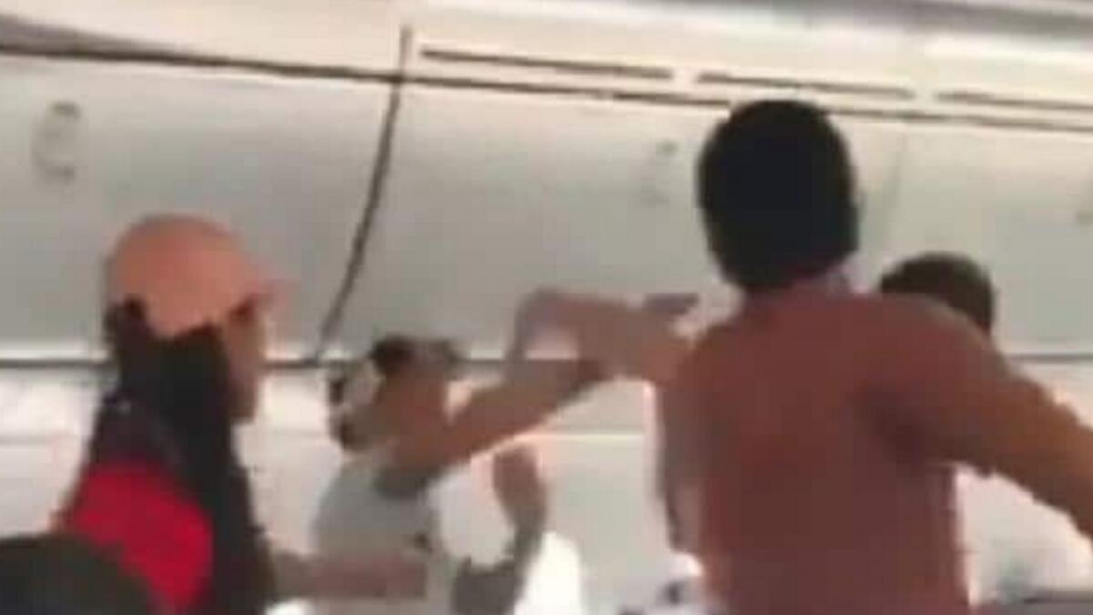 Video: Flight forced to land after unruly passenger tears clothes off