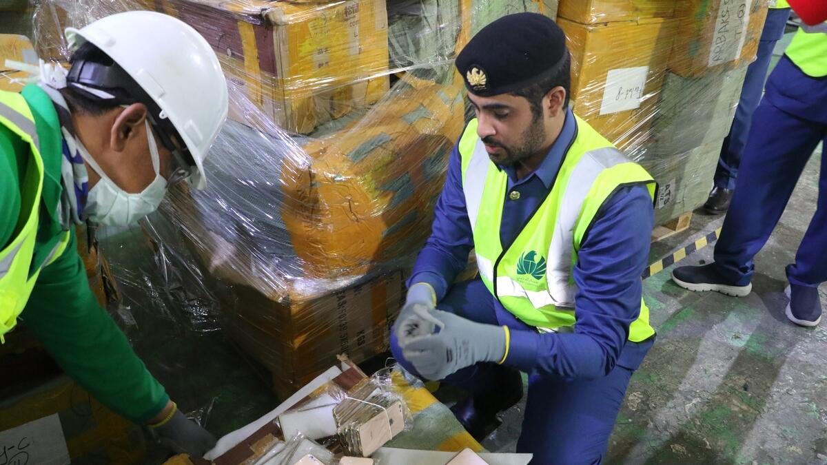 fake, apple, michael kors, products, seized in Dubai