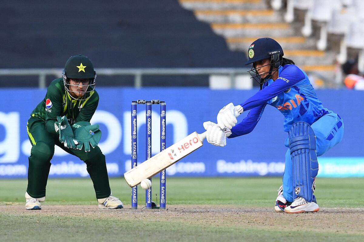 India's Jemimah Rodrigues (right) plays a shot as Pakistan's wicketkeeper Muneeba Ali looks on. — AFP