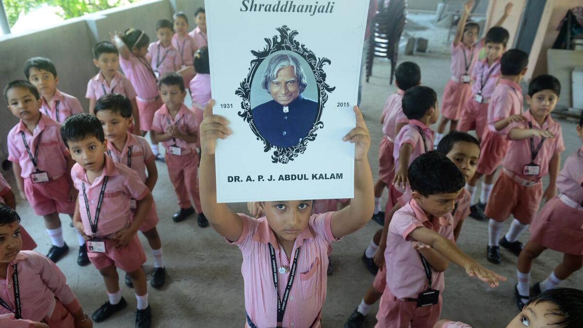 Schoolchildren pay homage to A. P. J. Kalam in Siliguri on Tuesday.