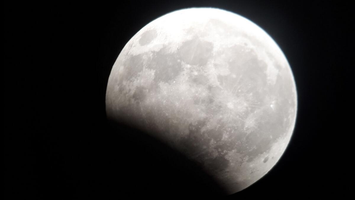 Video: Partial lunar eclipse shined in Dubai on Monday
