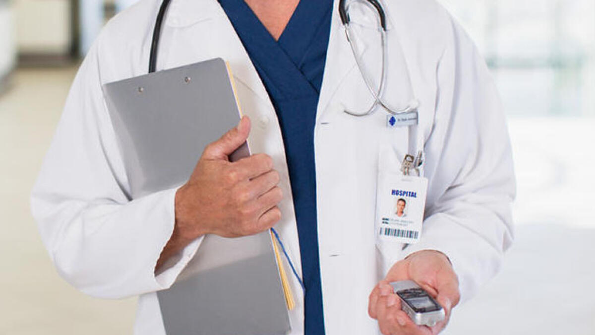 UAE warns against wearing white coats outside health facilities