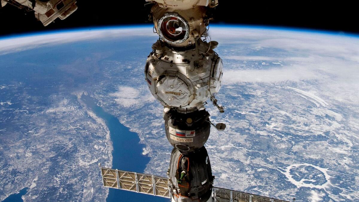 This undated handout photo taken by Russian cosmonaut Sergei Korsakov and released by Roscosmos State Space Corporation shows a Soyuz capsule of the International Space Station (ISS) during its fly. — AP