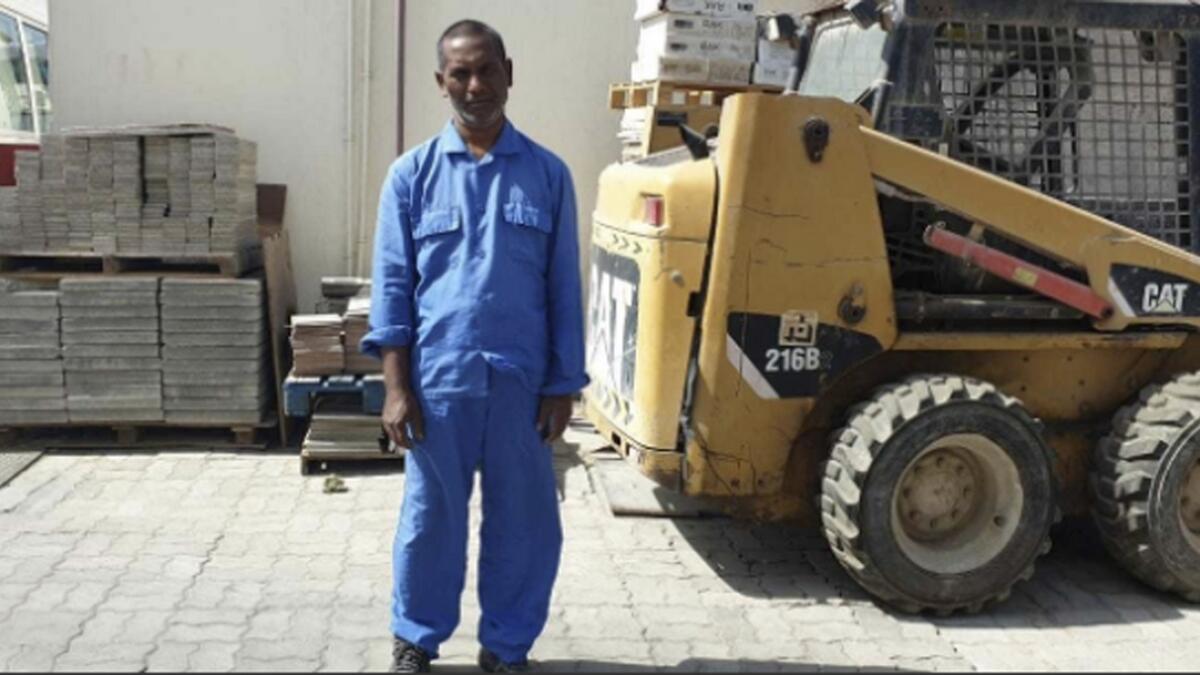 Ali Akbar starts his shift at 6am and, throughout the day, he works under the sun in Abu Dhabi.— Supplied photo