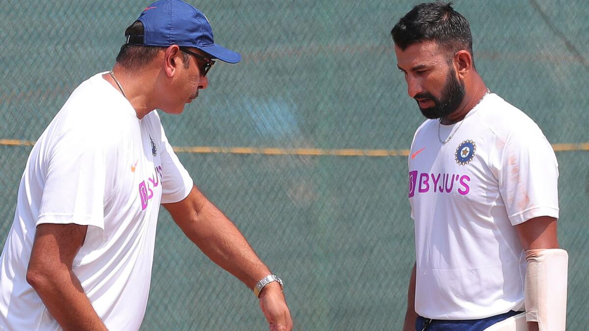 Cheteshwar Pujara and coach Ravi Shastri get ready for the World Test Championship final against New Zealand. — AP