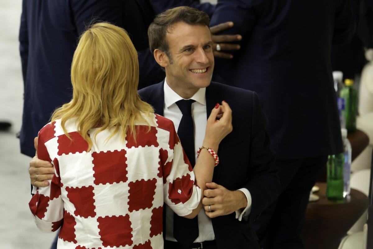 French President Emmanuel Macron celebrates after France won the Qatar 2022 World Cup semi-final. Photo: AFP