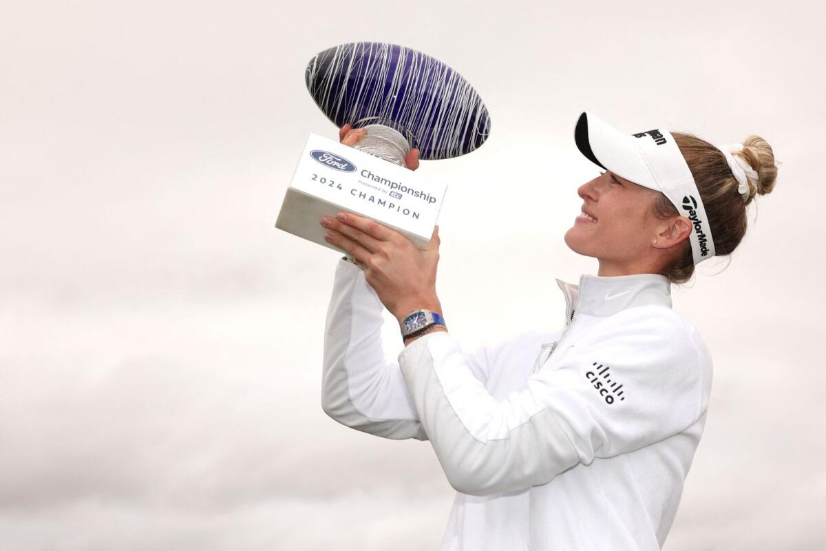 Nelly Korda of the United States poses with the trophy after the final round of the Ford Championship. — AFP