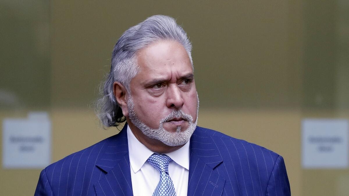 Indian tycoon Vijay Mallya leaves after attending a hearing at Westminster Magistrates Court in London. - AP file photo
