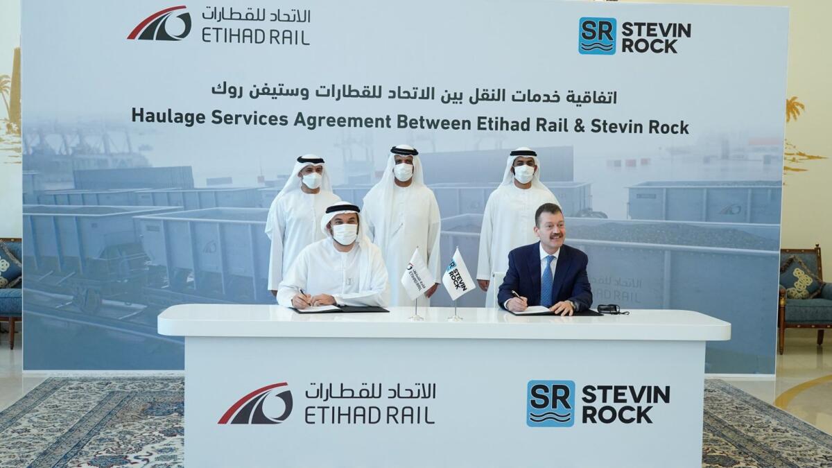 His Highness Sheikh Saud bin Saqr Al Qasimi,  Member of Supreme Council and Ruler of Ras Al Khaimah, joins Shadi Malak, CEO, Etihad Rail and  Naser Bustami, GM, Stevin Rock for the signing of a significant agreement.