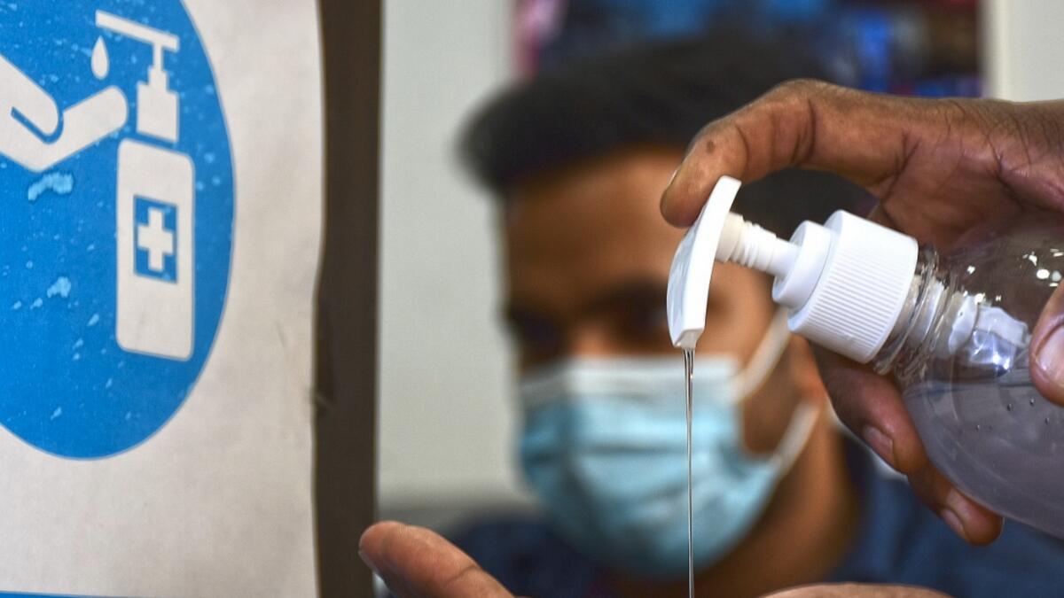 STAY PROTECTED: Residents are now more conscious of their hand hygiene, with sanitisers available everywhere. Photo by Shihab/KT