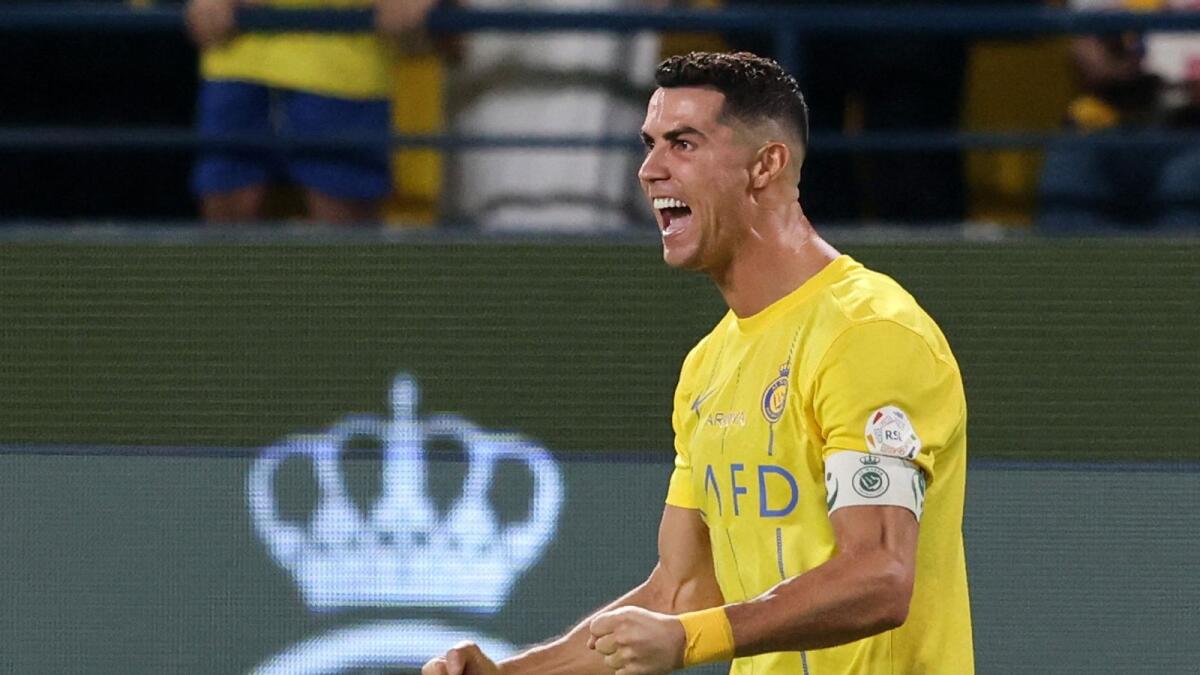 Al Nassr's Cristiano Ronaldo celebrates after a match against Al Ahli. — Reuters