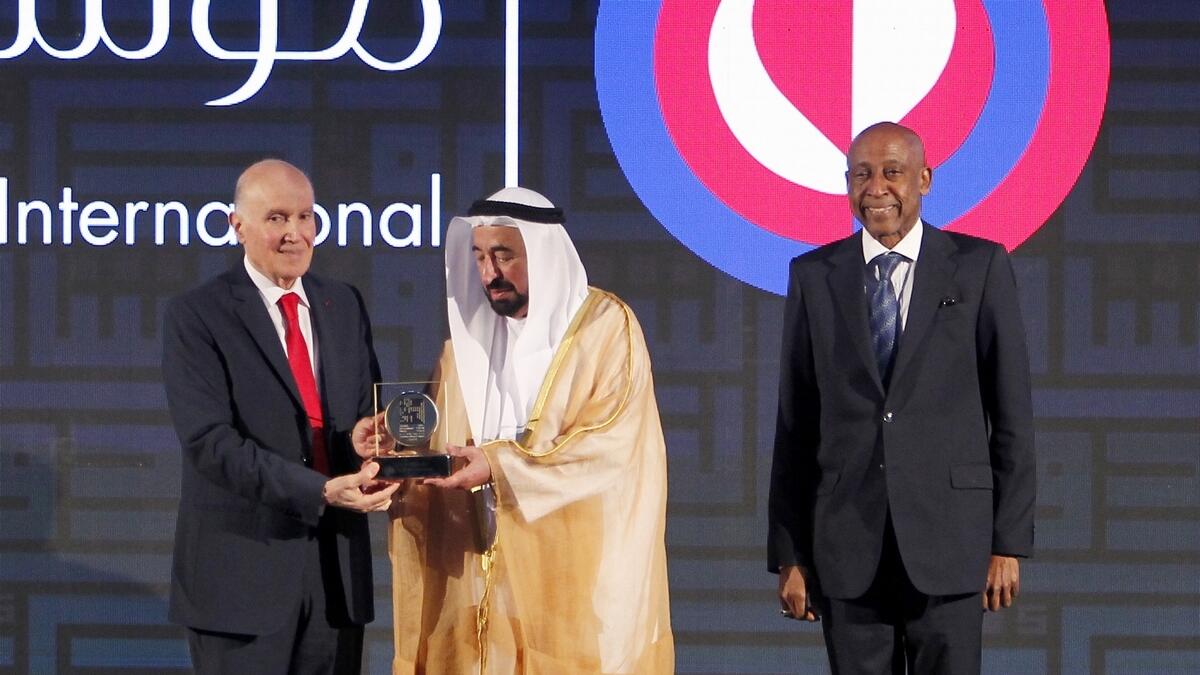 Dr Kamel Assaad Mohanna, President and Founder of Amel Association International getting his award from His Highness Sheikh Dr Sultan bin Muhammad Al Qasimi, Supreme Council Member and Ruler of Sharjah.– Photo by M. Sajjad