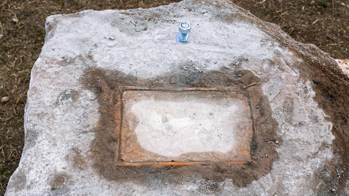 General view of a stone from under a statue of Confederate Gen. Robert E. Lee, and in which the crew founding it believe is a time capsule that was buried in 1887 in Richmond, Virginia. — Reuters