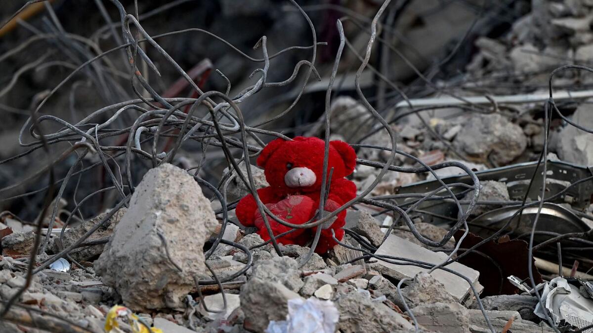 A teddy bear on the rubble of a collapsed building in Kahramanmaras, Turkey. — AFP