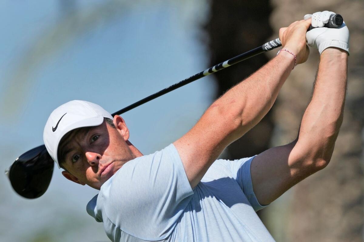 Rory McIlroy of Northern Ireland tees off on the 7th hole during the second round of the $2.5m Dubai Invitational golf tournament at the Dubai Creek Resort. - AP